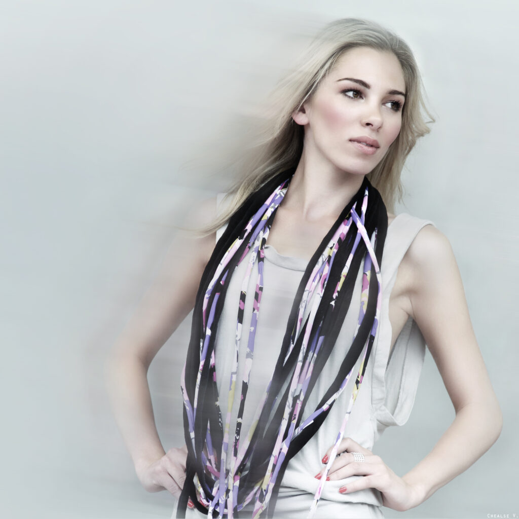 Alana wearing Joy French dress and Simply Phoebe necklaces