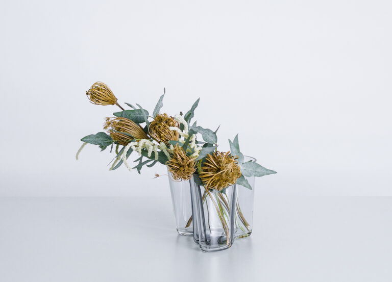 Recycled Glassware and Everlasting Blooms: Sustainable Celebration Settings