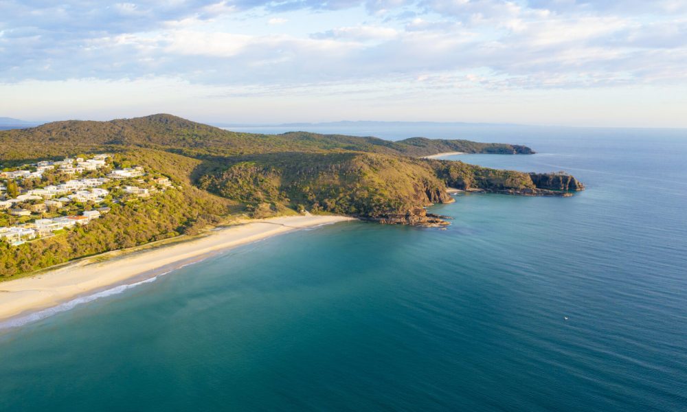 A drone shot of the gorgeous Sunshine Beach in Noosa