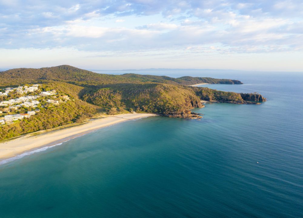 A drone shot of the gorgeous Sunshine Beach in Noosa